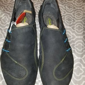 Clark's primo black slip on shoes. New with tags